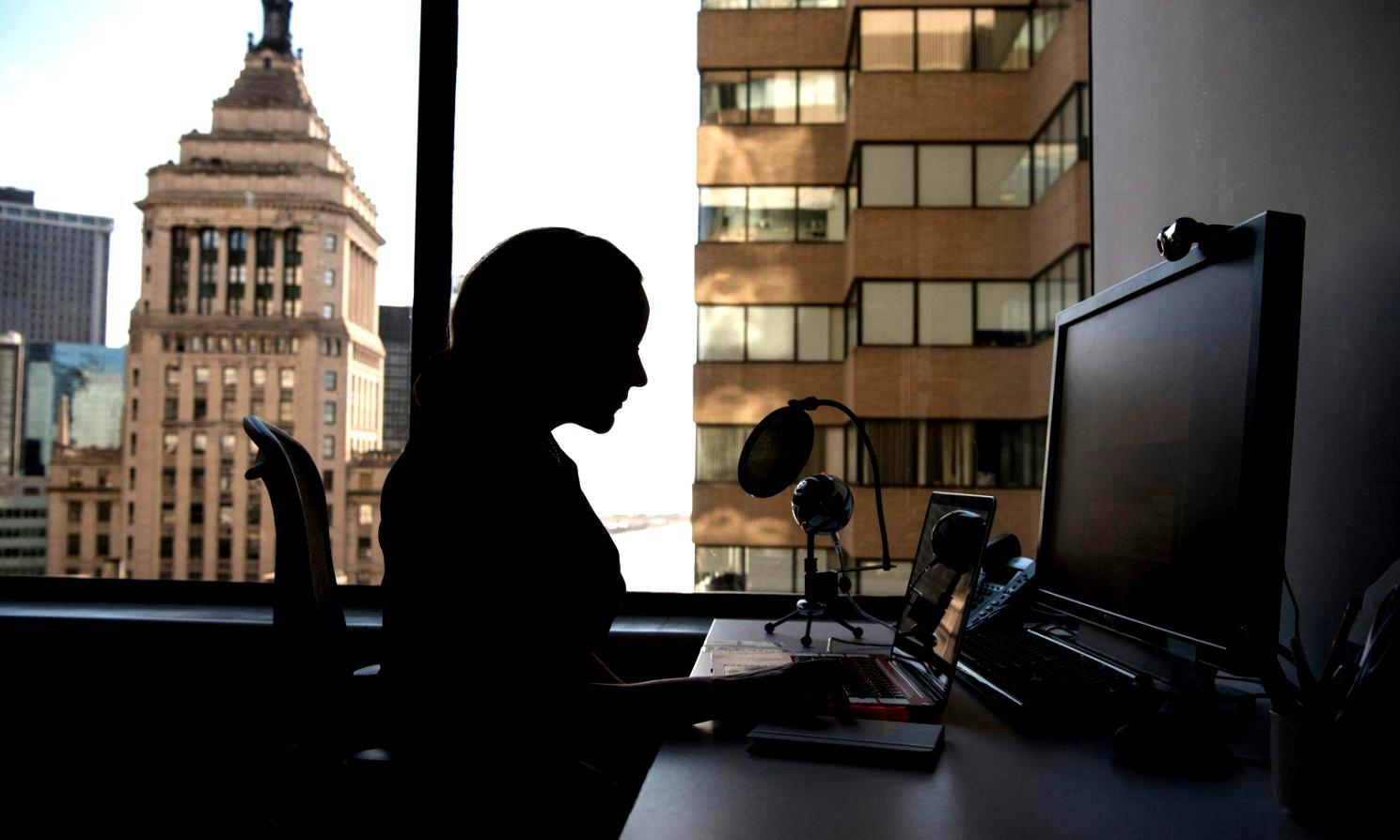 Collaborative learning environment with students working together on financial analysis projects